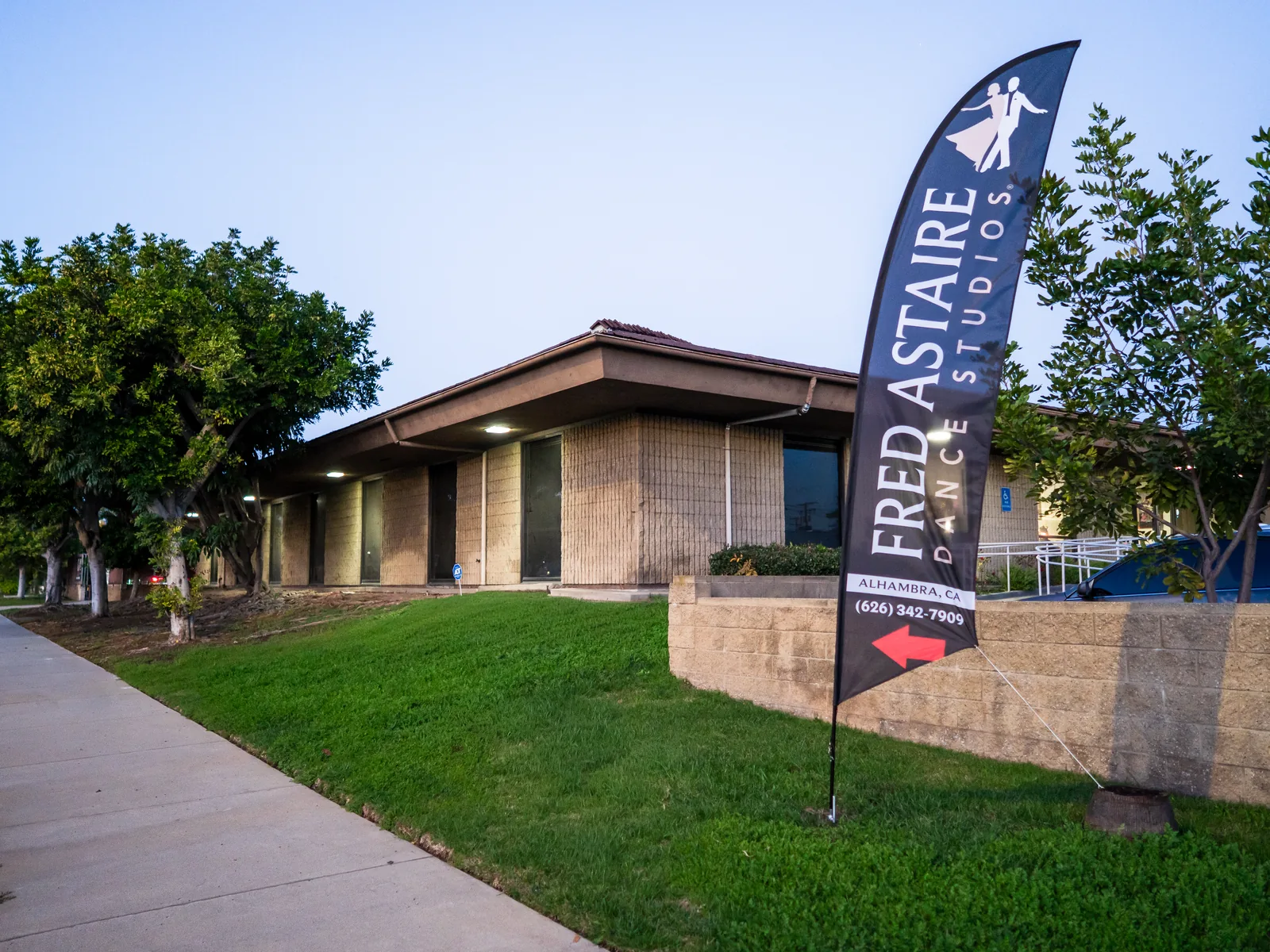 Dance studio alhambra contact point, the studio building on Orange Street with its flag out front