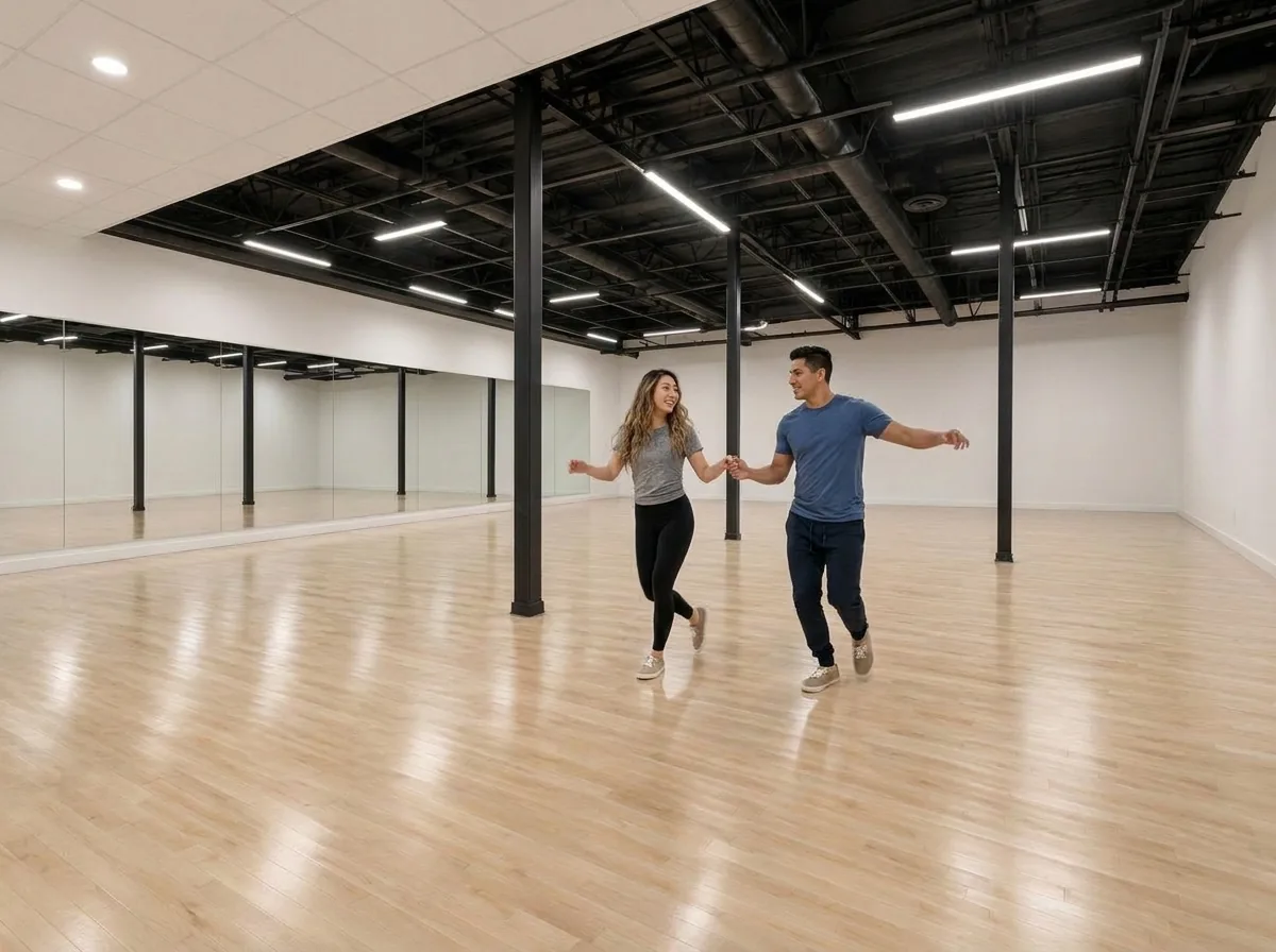 Couple dancing cha cha in the studio