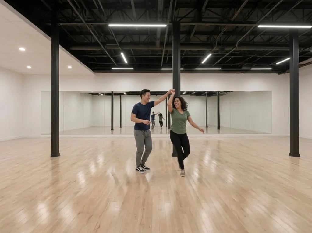 Couple dancing East Coast Swing, a social cousin of jive dance lessons Alhambra students take