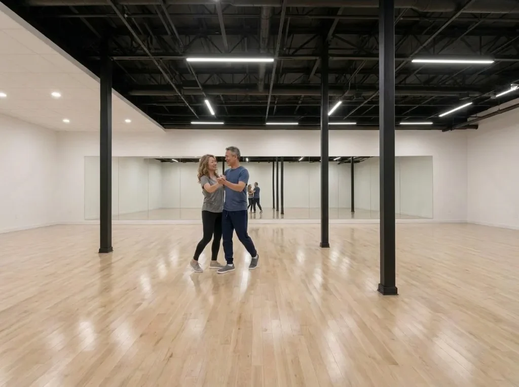 Couple dancing foxtrot together on the studio floor