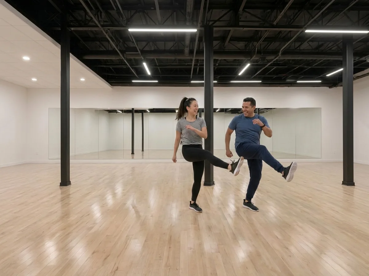 Instructor demonstrating jive kicks and footwork to a student