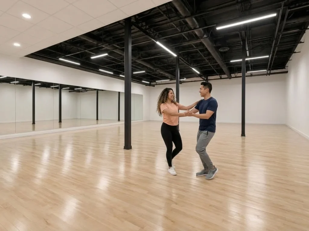 Couples dancing a Latin style together on the studio floor in Alhambra