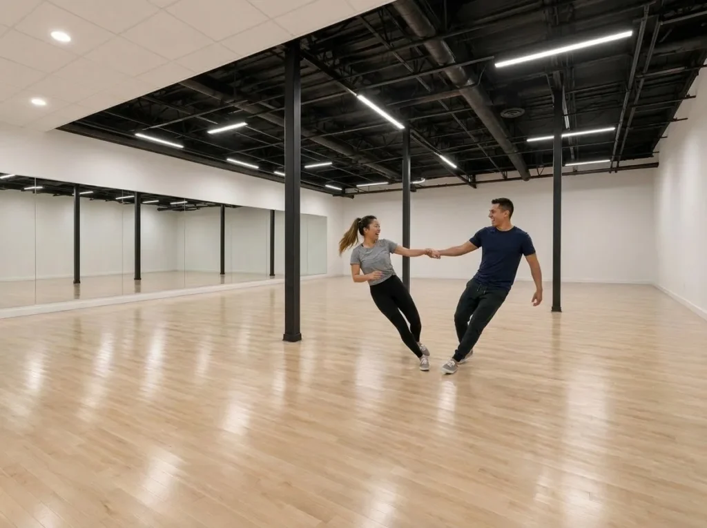 Couple dancing Lindy Hop with a stretchy swingout connection in Alhambra