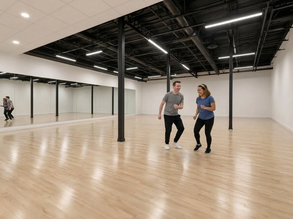 Instructor demonstrating the Lindy Hop swingout to a student