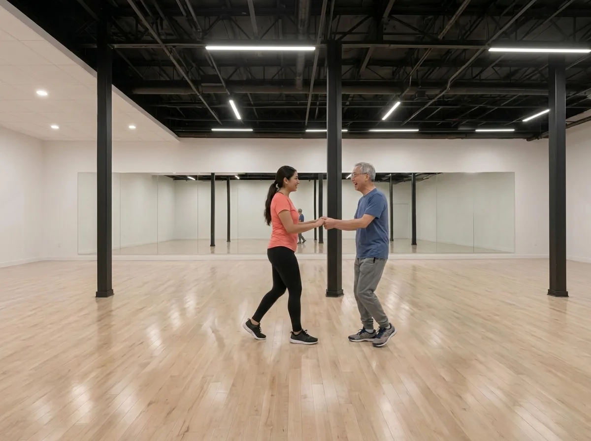 Beginner learning mambo basics with an instructor in Alhambra