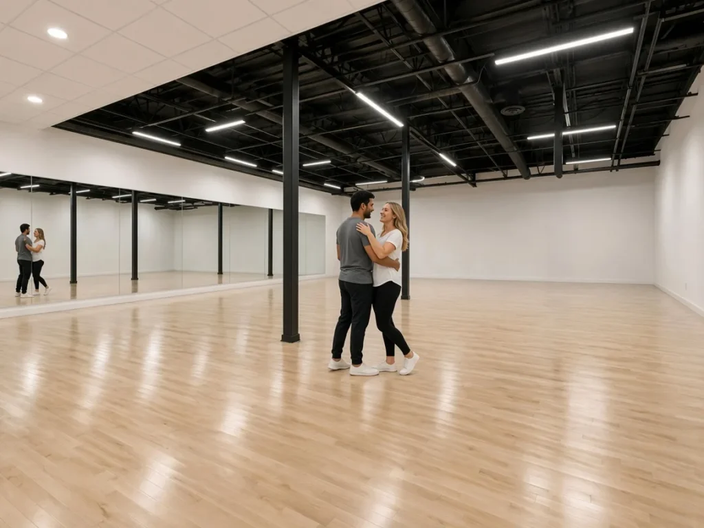 Couple learning partner turns in nightclub dance lessons Alhambra