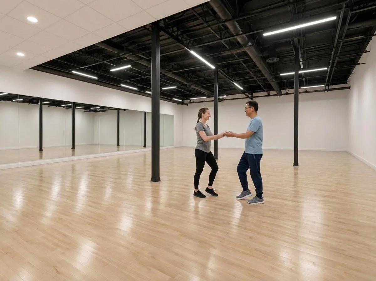 Beginner learning paso doble basics with an instructor in Alhambra