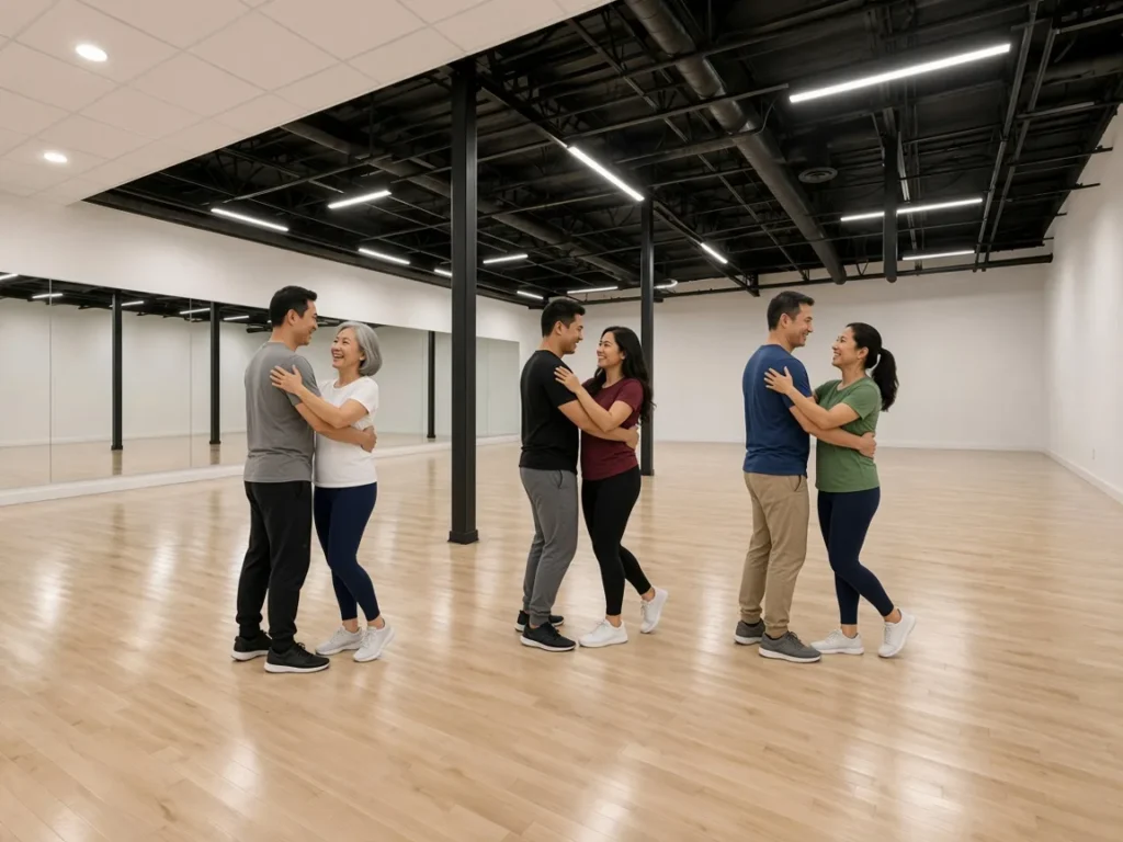Students dancing together at a studio practice party