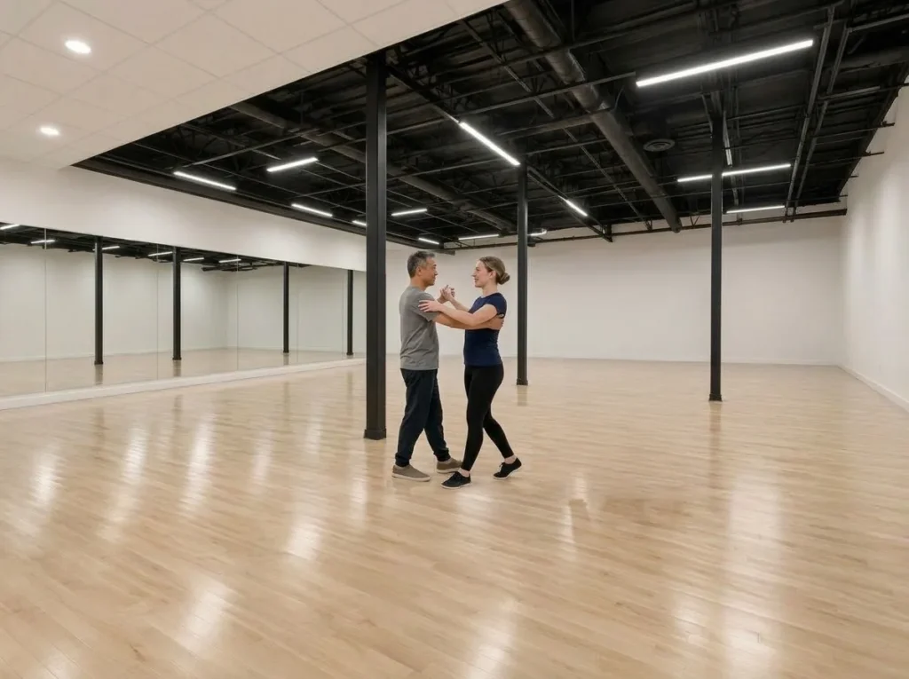 Instructor teaching a one-on-one private dance lesson