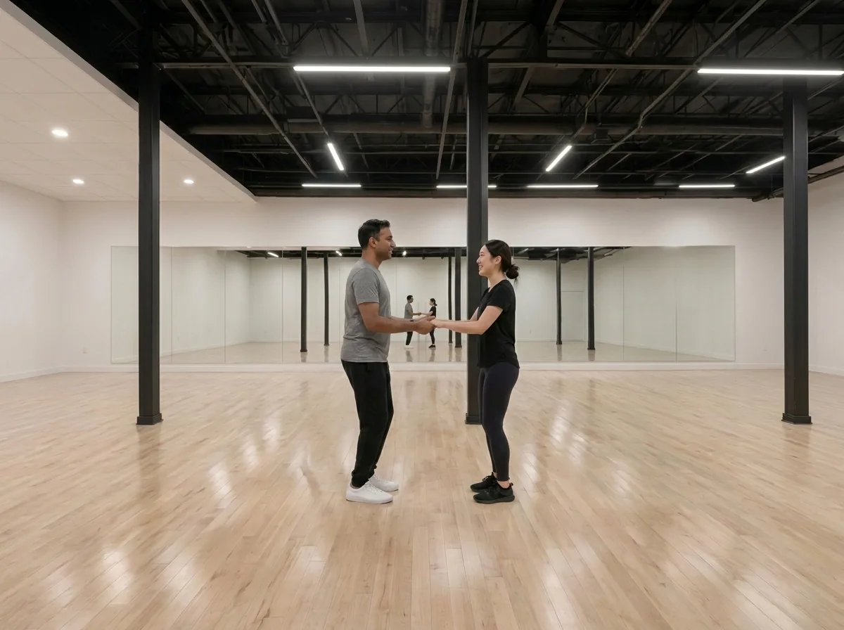 Instructor guiding a first-time student through the samba basic step in Alhambra