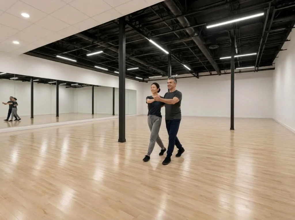 Couple dancing a smooth ballroom style across the floor