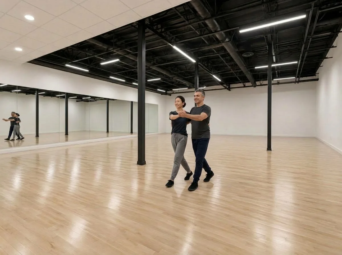 Couple dancing a smooth ballroom style across the floor