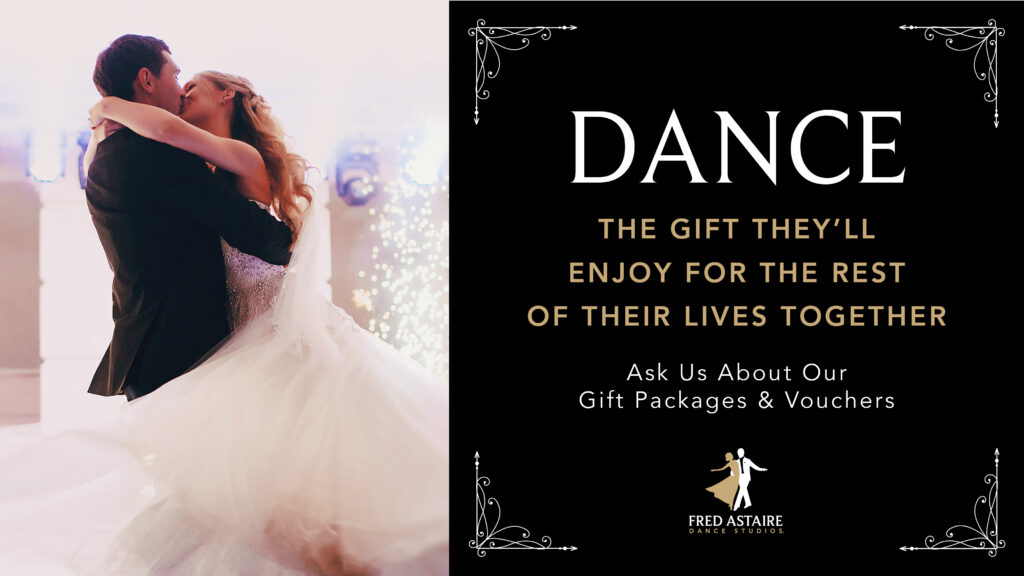 dancers embracing because someone decided to give the gift of dance