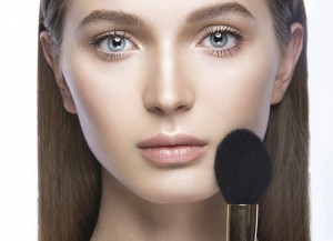 Beautiful young girl with a light natural make-up and
