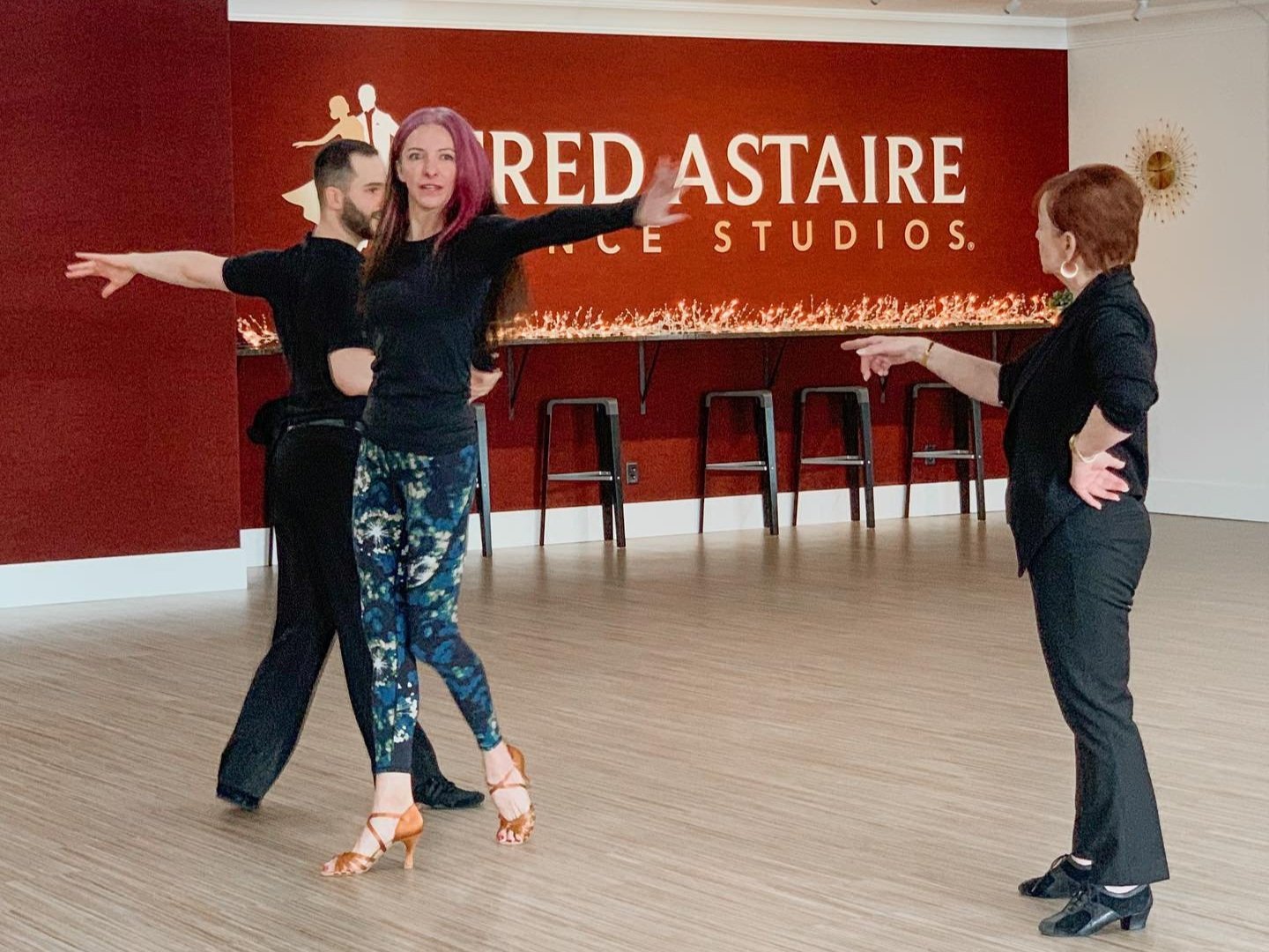Award-winning dancer and coach Jan Mattingly instructs a pair of dancers at the Fred Astaire dance studio in downtown Boise.