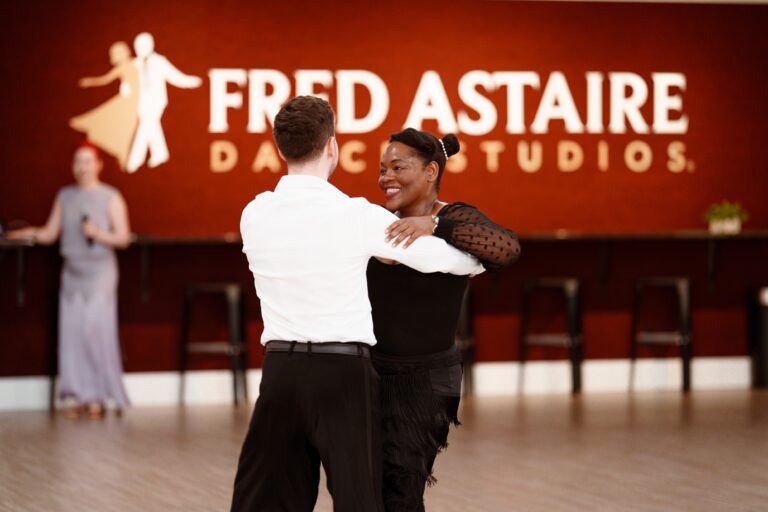 Dance FAQs - Student and instructor dancing at Fred Astaire Boise dance studio.