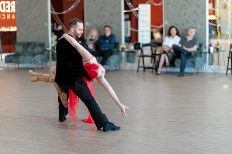 Instructors demonstrating the Mambo dance at a Boise dance studio.