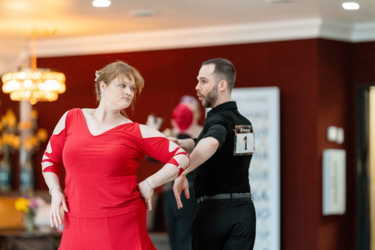 A student and instructor practicing the Merengue dance in Boise.