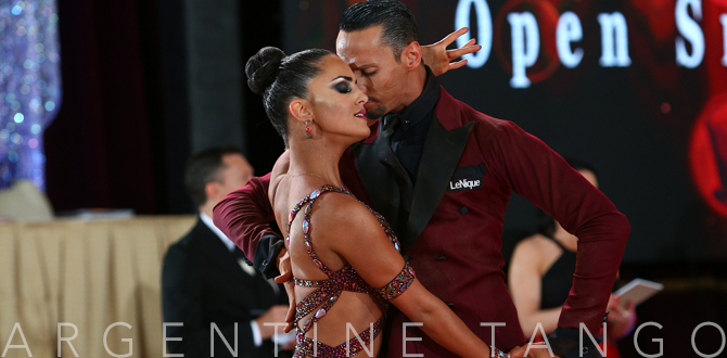 Man and woman performing the Argentine Tango at a competition.