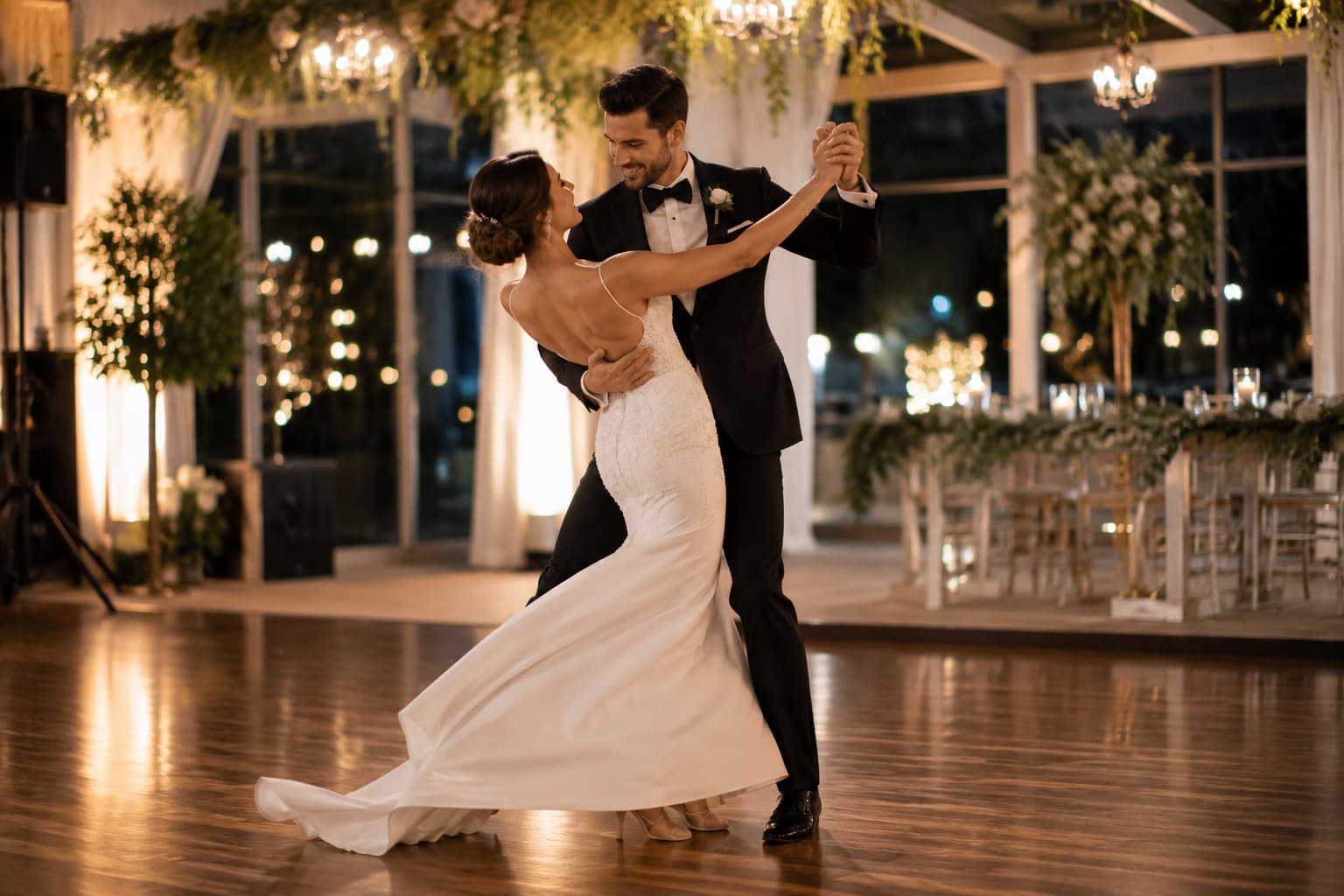 Bride and groom sharing an elegant first dance at their reception, representing wedding dance lessons in Cold Spring.