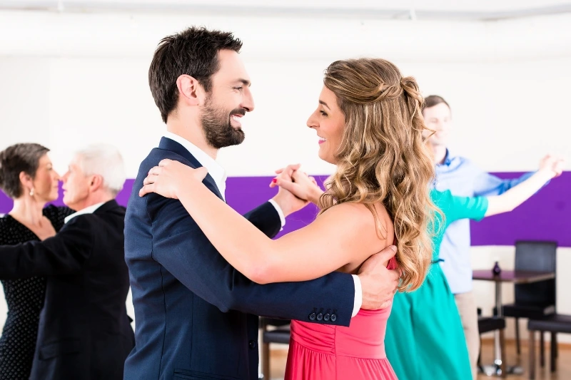 A man and woman take dance classes at a Durham dance studio.