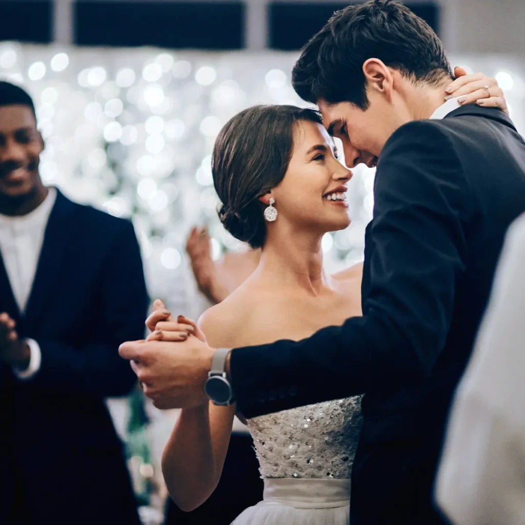 Bride and groom dancing.