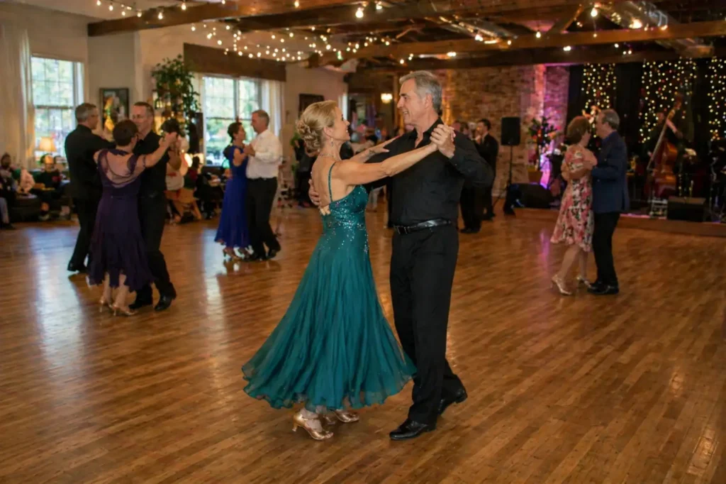 Couples practicing dance floor etiquette while ballroom dancing in a social setting