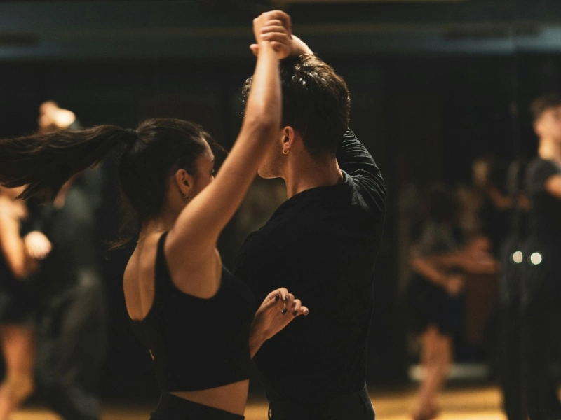 young couple dancing, demonstrating how to count music in dance.