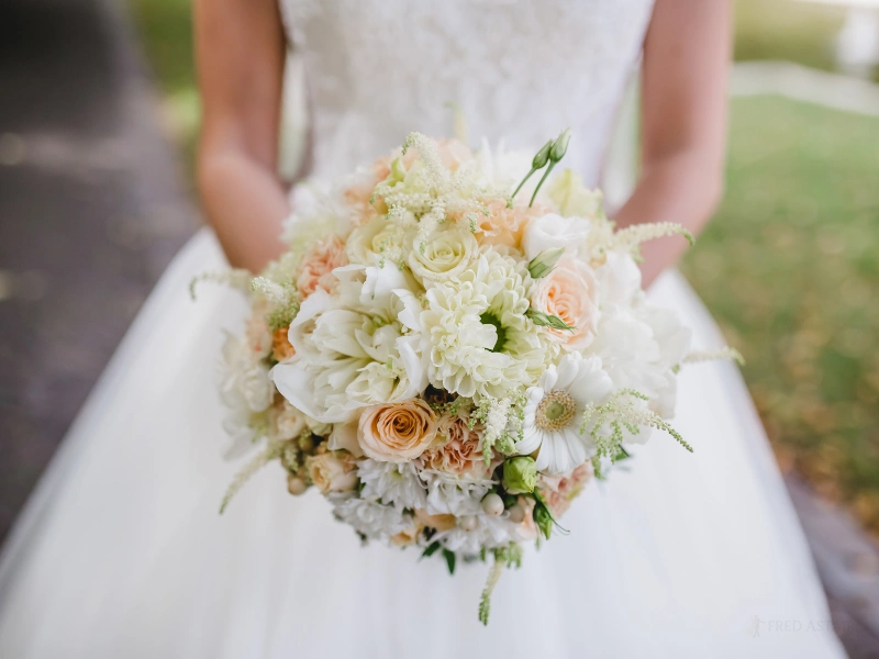 bride with flowers. image complements the Chapel Hill Wedding Dance Lessons page.