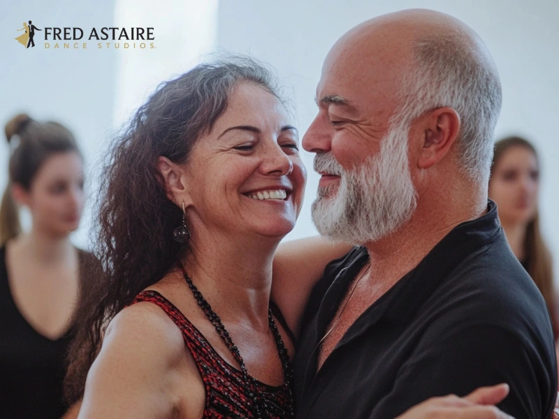 Couple practicing ballroom dance lessons together at Fred Astaire Durham