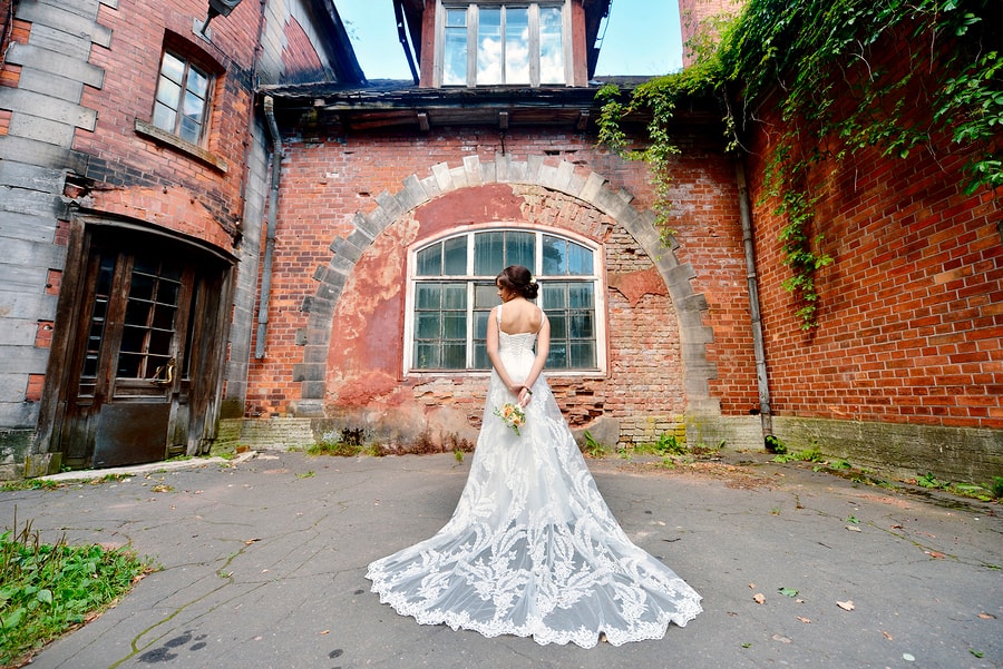 Beautiful bride with bouquet and lace veil in Wethersfield, CT