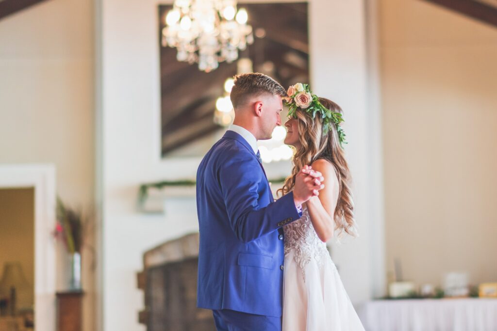 Young couple dancing at their wedding.