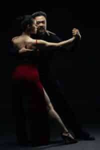Man and woman performing the tango.