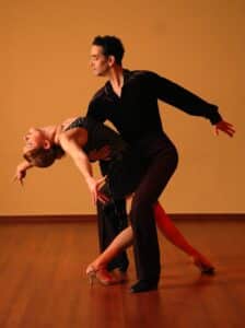 Man and woman performing the Samba.