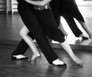 dancing couple in black and white focused on feet