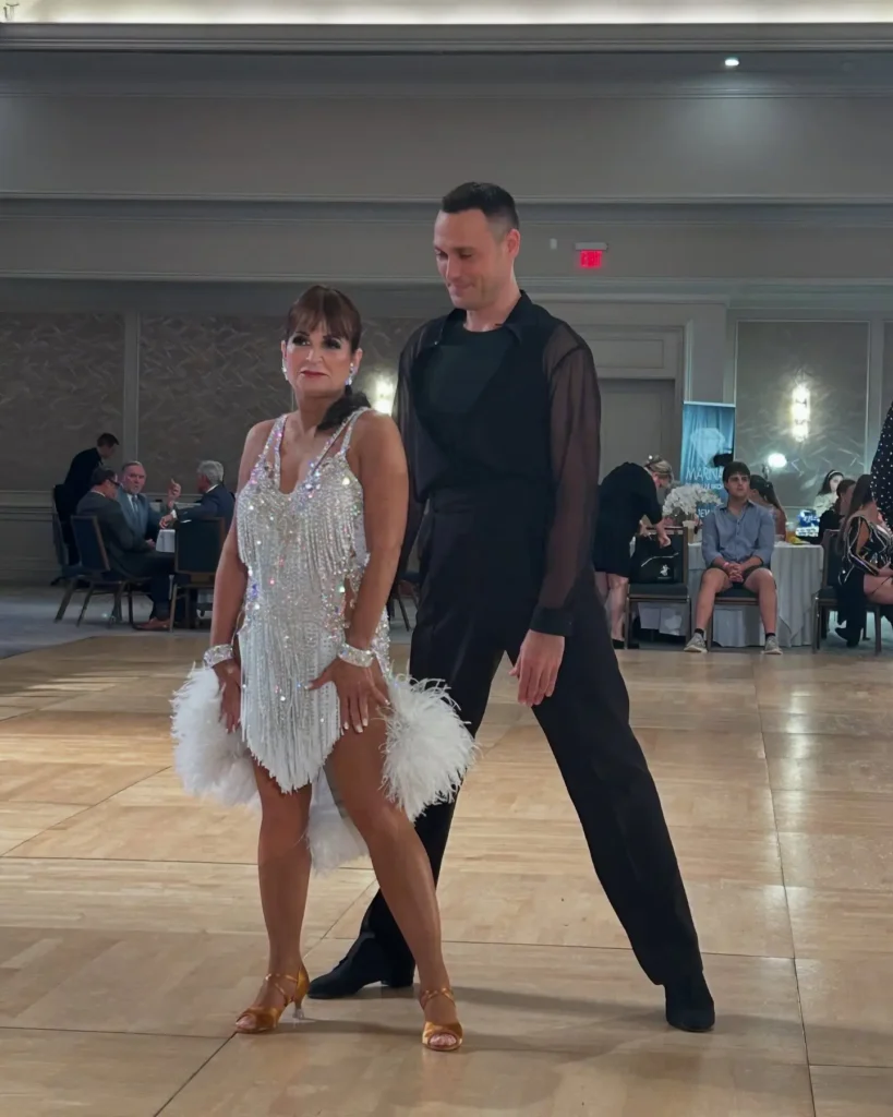 Latin dance couple on the dance floor.