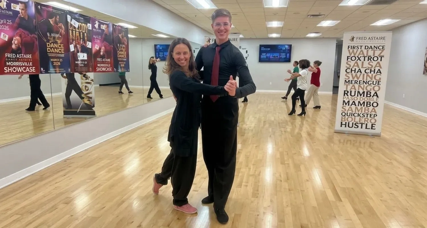 Couple in dance hold during a class at Fred Astaire Dance Studios in Morrisville, NC.