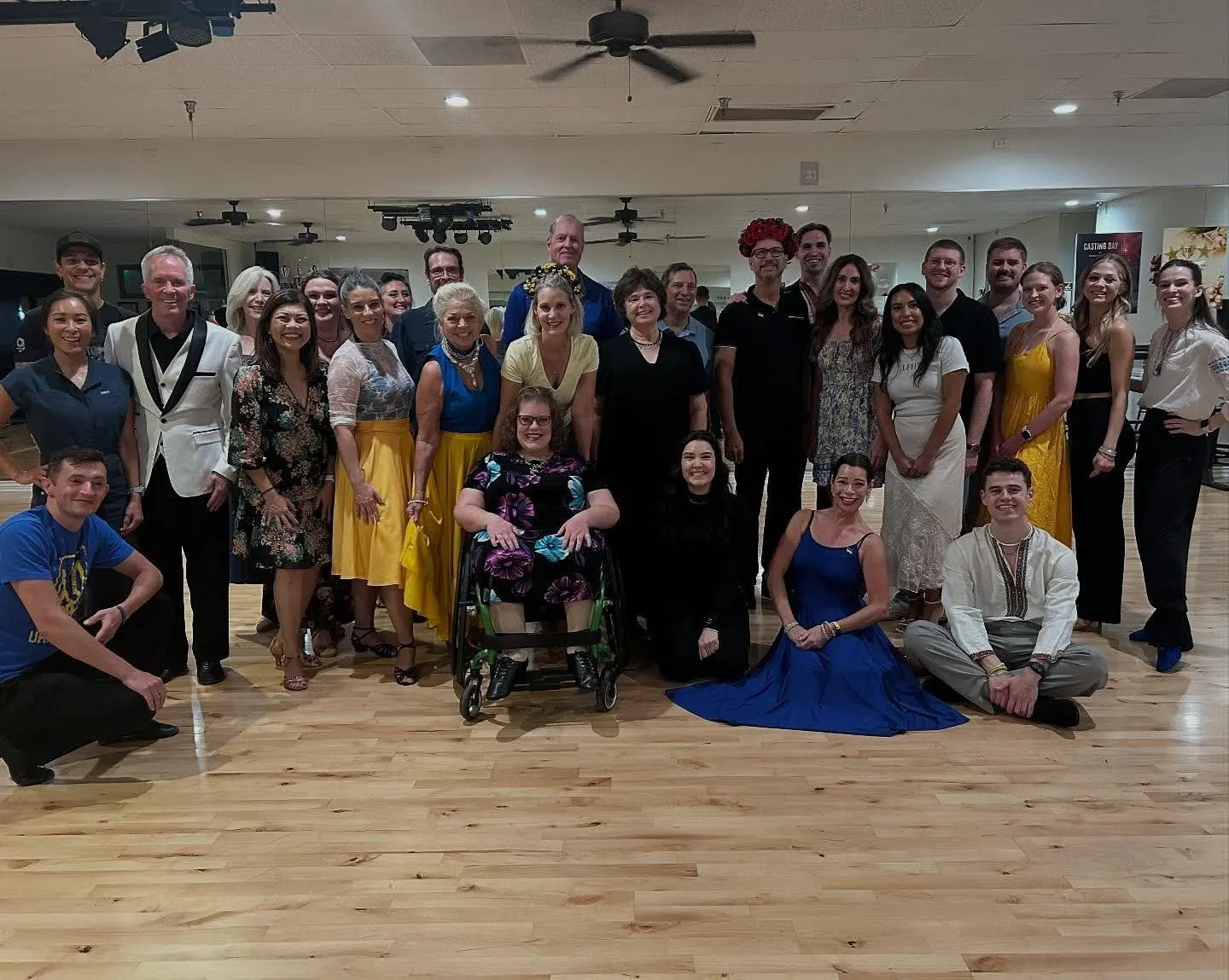 A group of people smiling in front of the camera after they've learnt the Dance Lessons Cost in Paradise Valley.