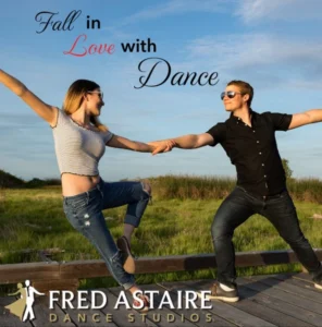 A couple dances outdoors together, exploring the Dance Style to Learn First while enjoying a fun and romantic dance experience.