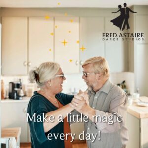 Older couple smiling and dancing together at home, promoting Date Night Dance Lessons in Peoria.