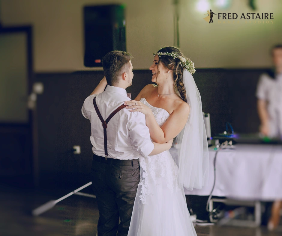 a couple dancing to an acoustic dance wedding song