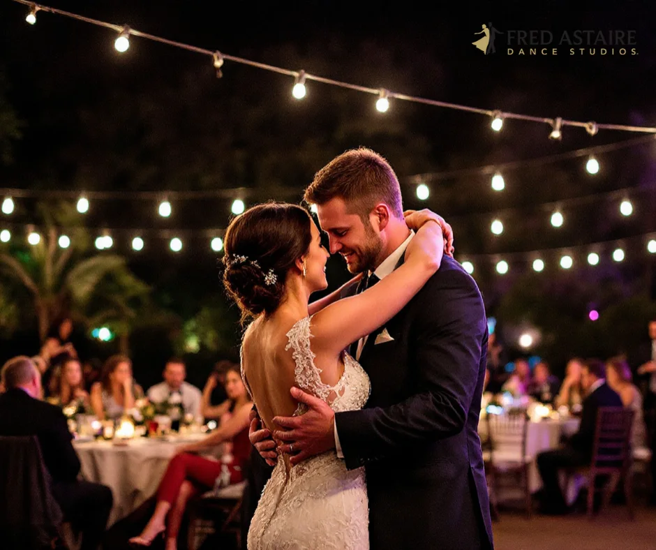 a couple dancing to a timeless wedding dance song