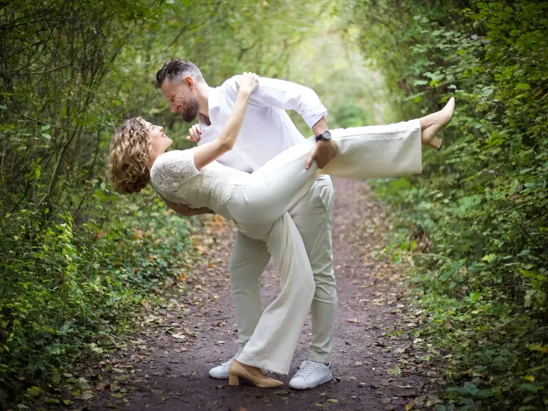 Newly wed couple dancing in nature. Learn how to choreograph wedding dance at Fred Astaire Raleigh.
