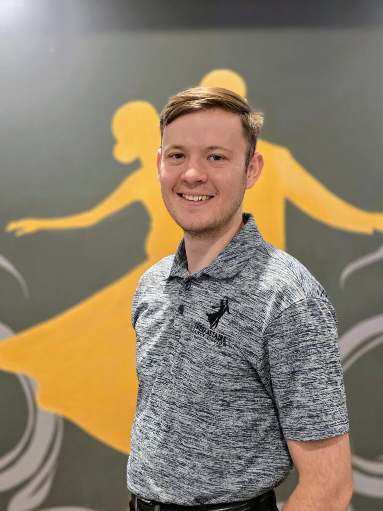 Yurii, professional ballroom and Latin dance instructor in Saratoga Springs NY, teaching social dancing, wedding dance lessons, and competitive coaching
