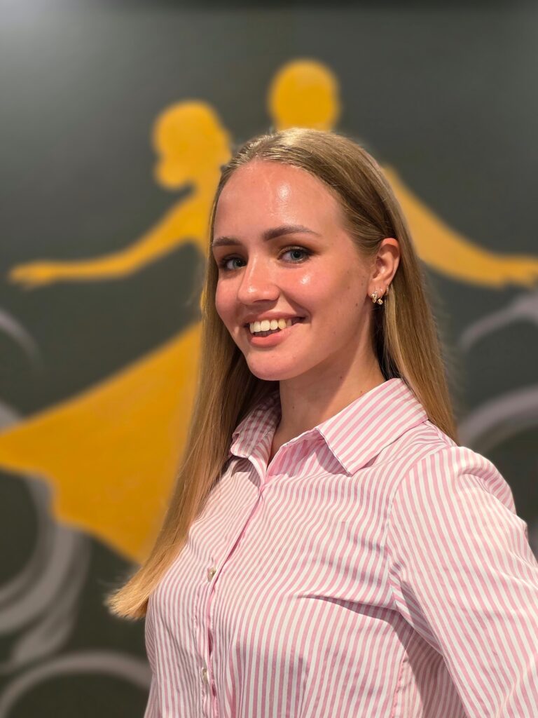 Anna Chetvertak, professional ballroom and Latin dance instructor in Saratoga Springs NY, teaching social dance, wedding dance lessons, and competitive coaching.