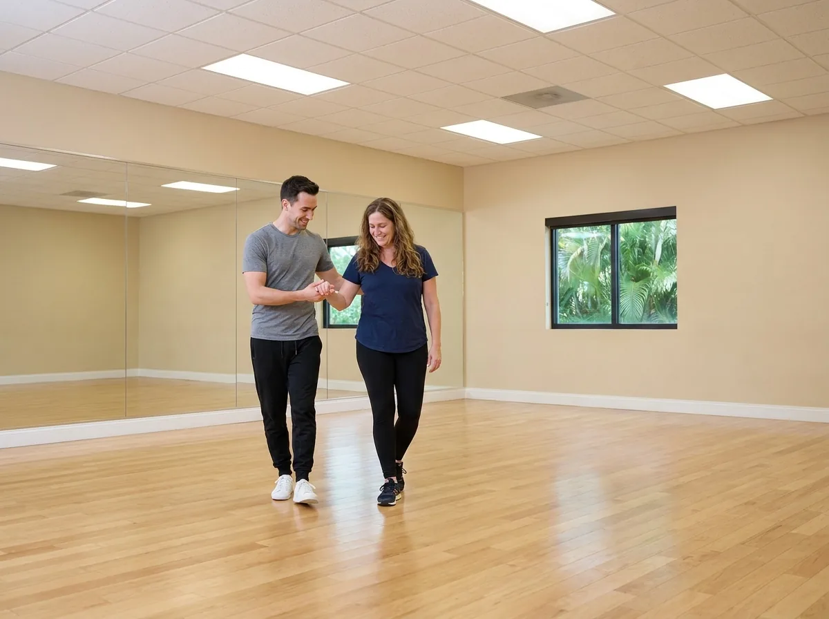Beginner learning paso doble basics with an instructor in Solana Beach