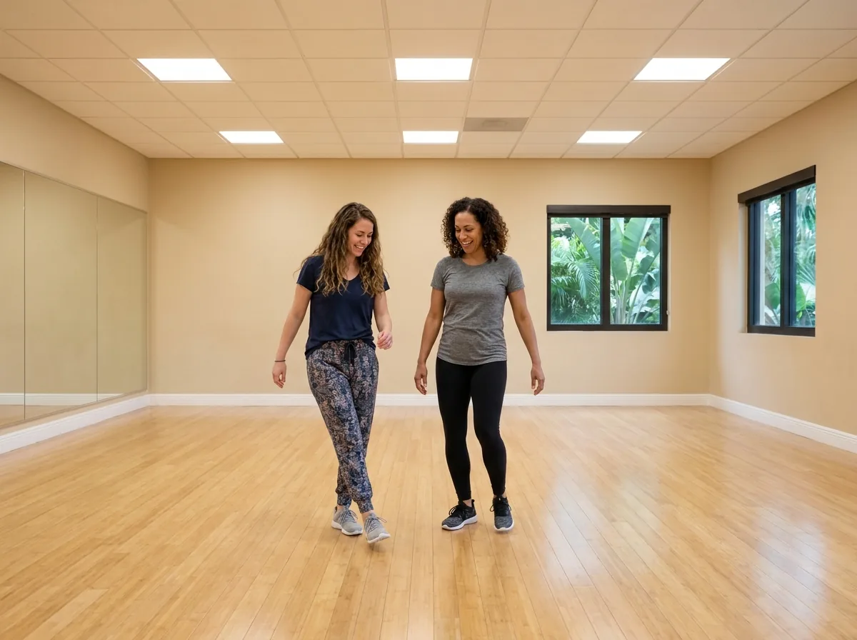Beginner learning rumba basics with an instructor in Solana Beach