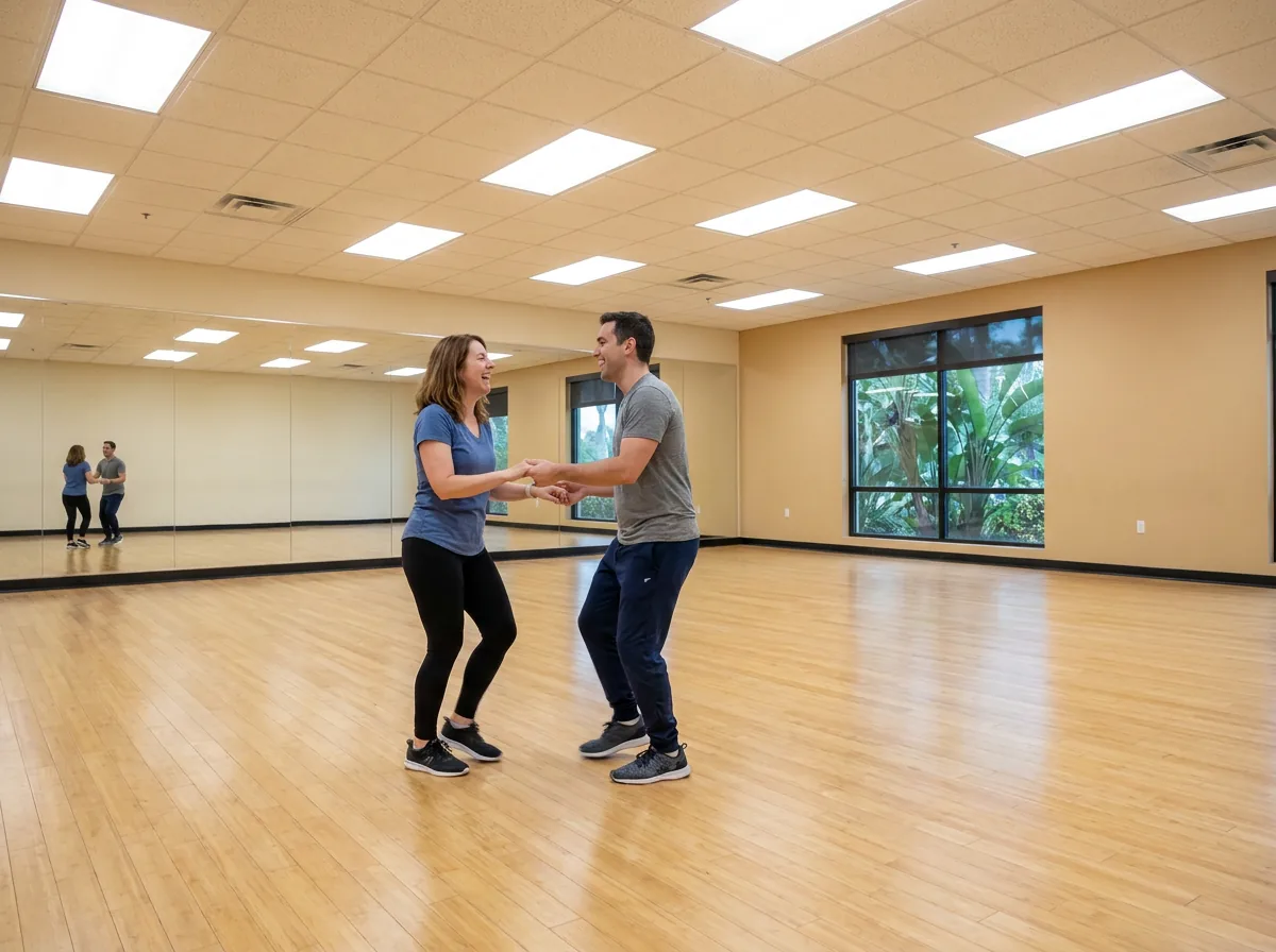 Beginner learning salsa basics with an instructor in Solana Beach