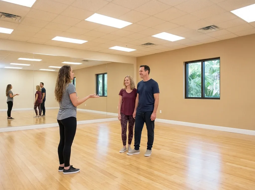 Instructor helping a student choose a standard ballroom style at Fred Astaire Dance Studios Solana Beach