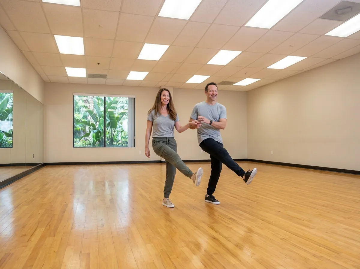 Instructor demonstrating jive technique to a student in Solana Beach